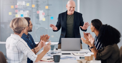 People discussing around conference table